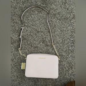 Michael Kors light pink new with tags cross body purse